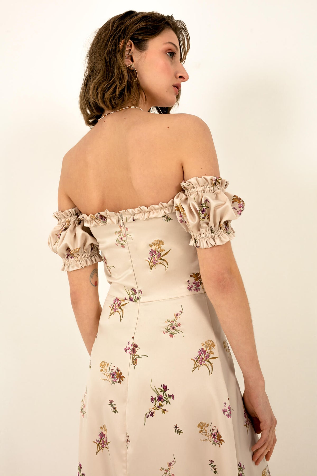 Model in Muse dress