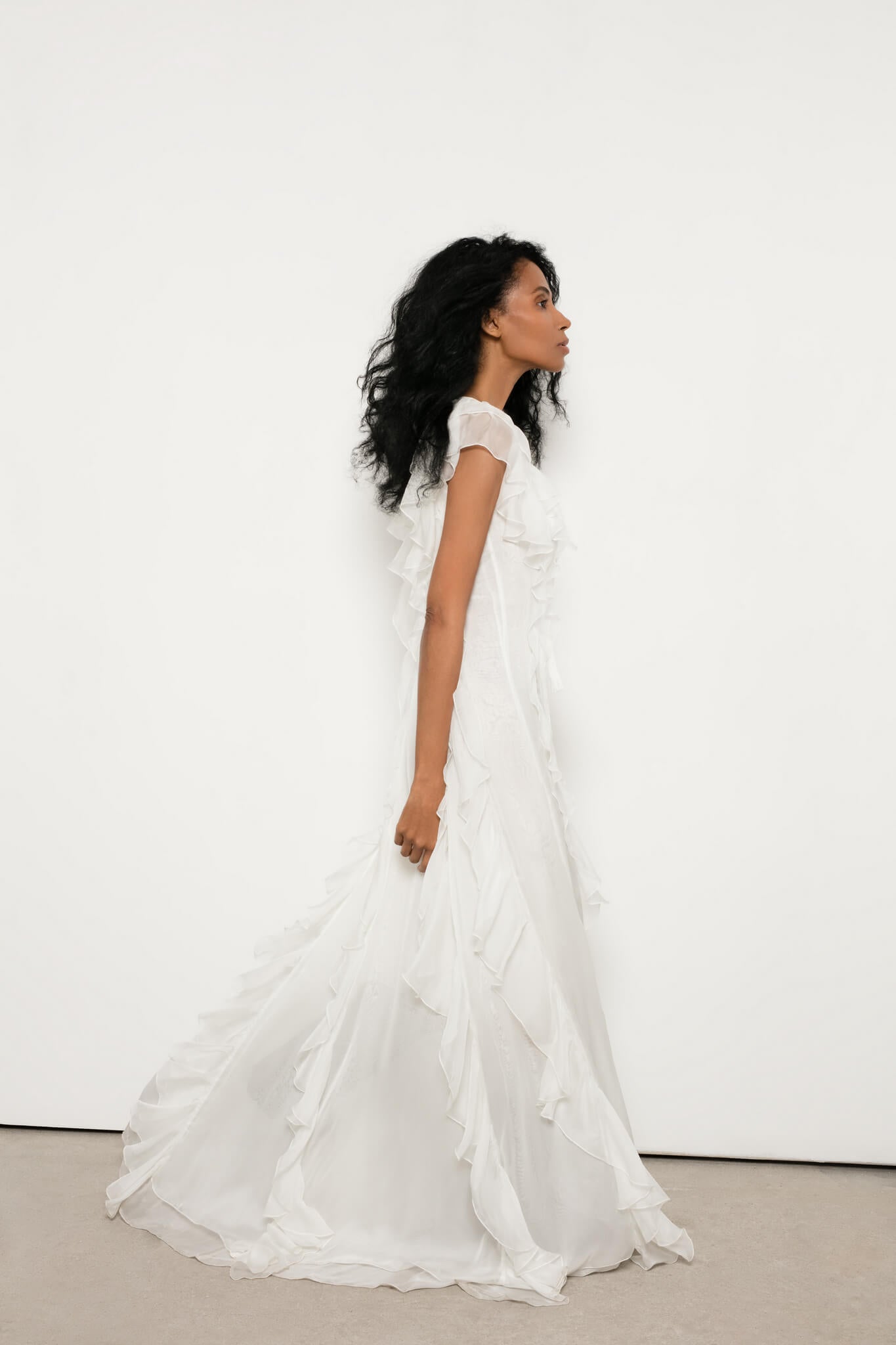 Model in Seashell Music dress side view