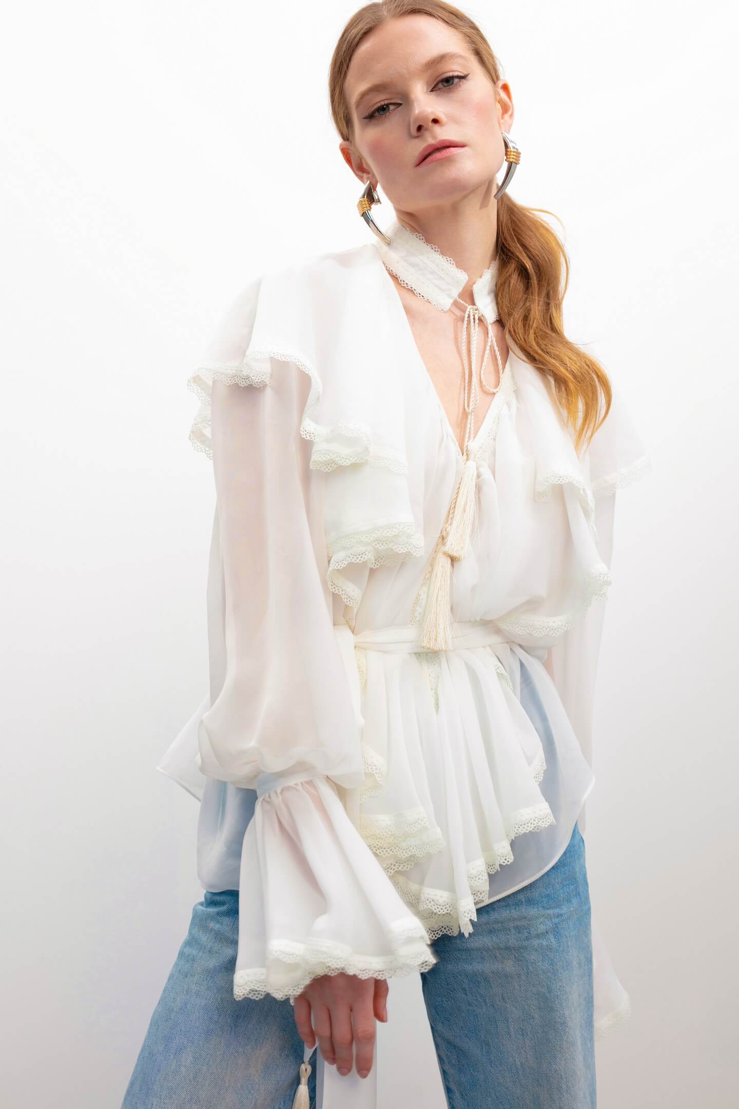 Model in Ocean Of Tenderness white blouse front view